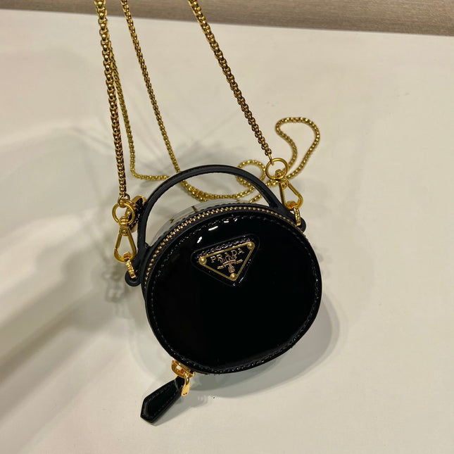 MINI ROUND BAG 8 IN BLACK GLOSSY CALFSKIN GOLD HARDWARE