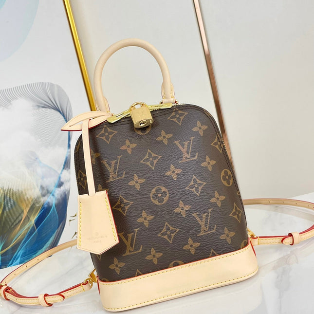 ALMA BACKPACK 20 IN BROWN MONOGRAM CANVAS AND BEIGE CALFSKIN TRIM GOLD BUCKLE