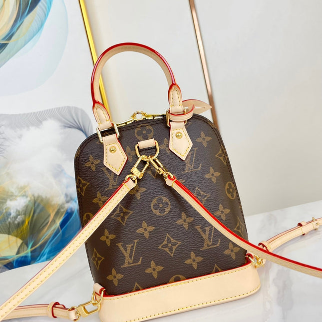 ALMA BACKPACK 20 IN BROWN MONOGRAM CANVAS AND BEIGE CALFSKIN TRIM GOLD BUCKLE