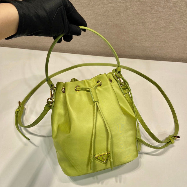 BUCKET BAG 19 IN APPLE GREEN RE-NYLON AND SAFFIANO LEATHER HANDLE