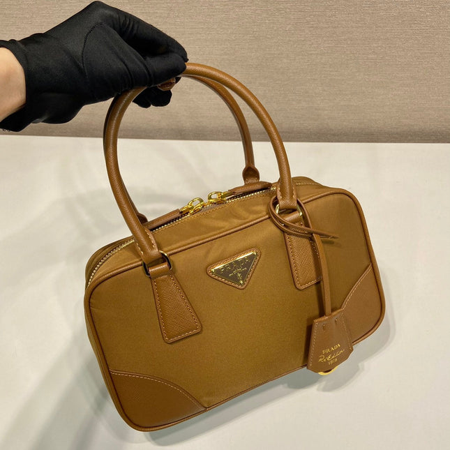 SMALL TOP HANDLE BAG 25 IN GOLDEN BROWN NYLON AND CALFSKIN TRIM