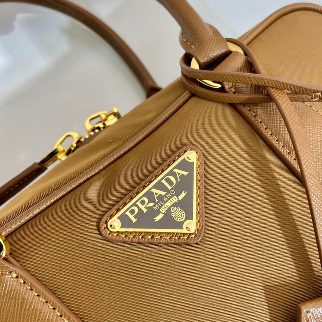 SMALL TOP HANDLE BAG 25 IN GOLDEN BROWN NYLON AND CALFSKIN TRIM