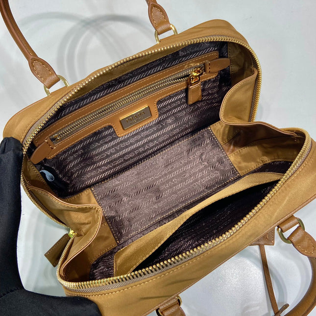 SMALL TOP HANDLE BAG 25 IN GOLDEN BROWN NYLON AND CALFSKIN TRIM