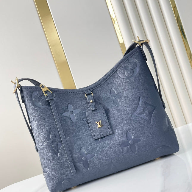 CARRYALL 29 IN DARK NAVY MONOGRAM EMPREINTE LEATHER