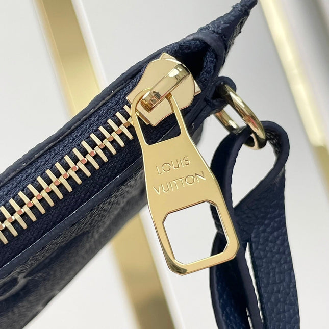 NEVERFULL MM 31 IN DARK NAVY MONOGRAM EMPREINTE LEATHER