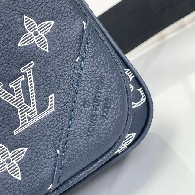 TRIO MESSENGER 25 IN PRUSSIAN BLUE MONOGRAM SHADOW CALFSKIN