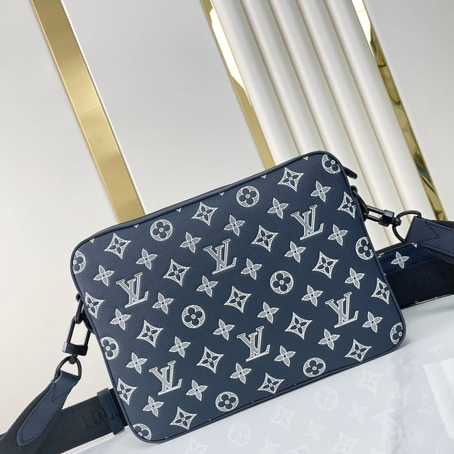 TRIO MESSENGER 25 IN PRUSSIAN BLUE MONOGRAM SHADOW CALFSKIN