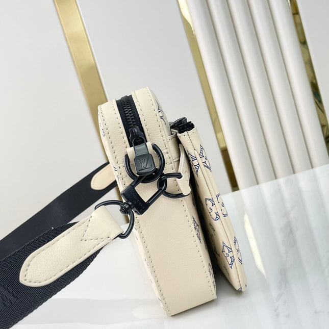 TRIO MESSENGER 25 IN CREAM BLUE MONOGRAM SHADOW CALFSKIN