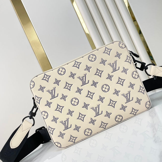TRIO MESSENGER 25 IN CREAM BLUE MONOGRAM SHADOW CALFSKIN