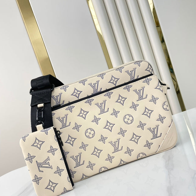 TRIO MESSENGER 25 IN CREAM BLUE MONOGRAM SHADOW CALFSKIN