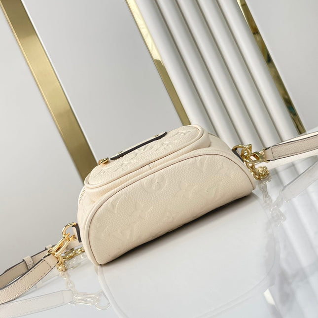 MINI BUMBAG 17 IN CREAM MONOGRAM EMPREINTE LEATHER GOLD HARDWARE