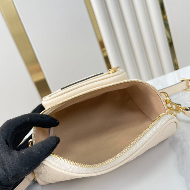 MINI BUMBAG 17 IN CREAM MONOGRAM EMPREINTE LEATHER GOLD HARDWARE