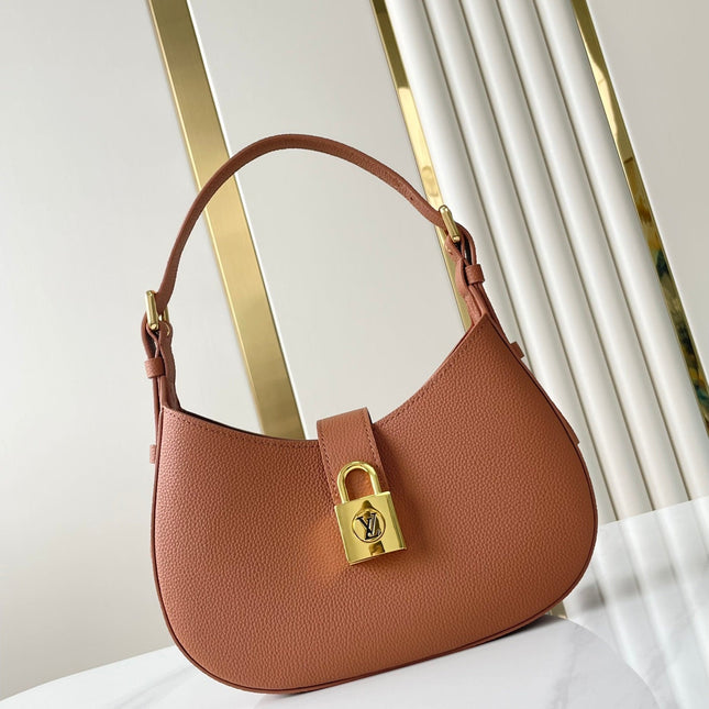 LOW KEY SHOULDER BAG 26 IN COGNAC GRAINED CALFSKIN GOLD BUCKLE