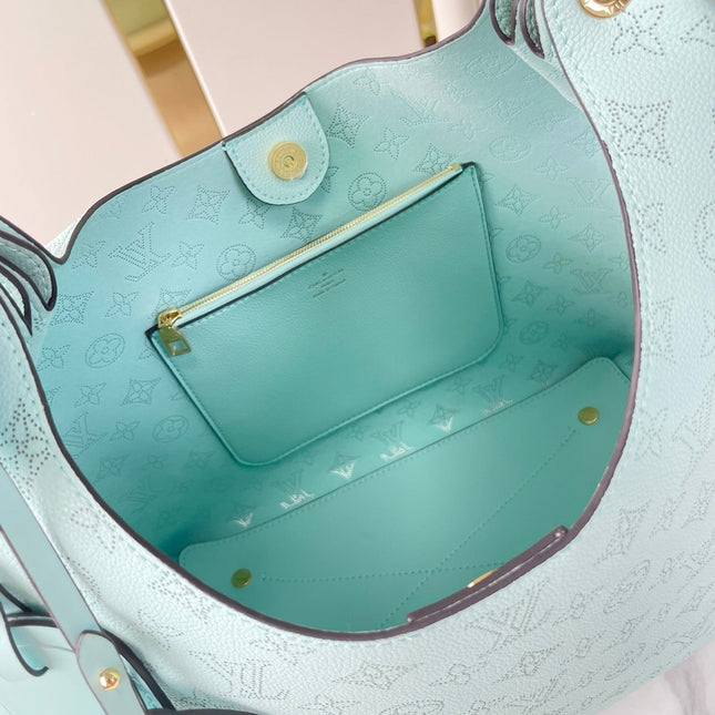 CARMEL 40 IN SKY BLUE MONOGRAM PERFORATED CALFSKIN