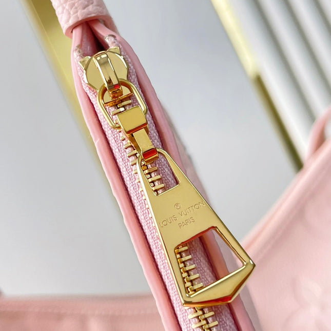 CARRYALL 29 IN LIGHT PINK MONOGRAM EMPREINTE LEATHER