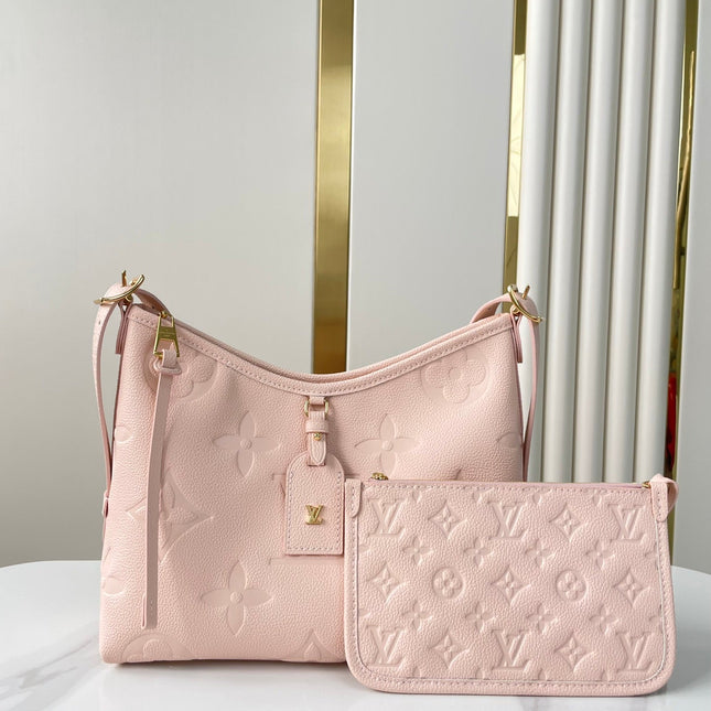 CARRYALL 29 IN LIGHT PINK MONOGRAM EMPREINTE LEATHER