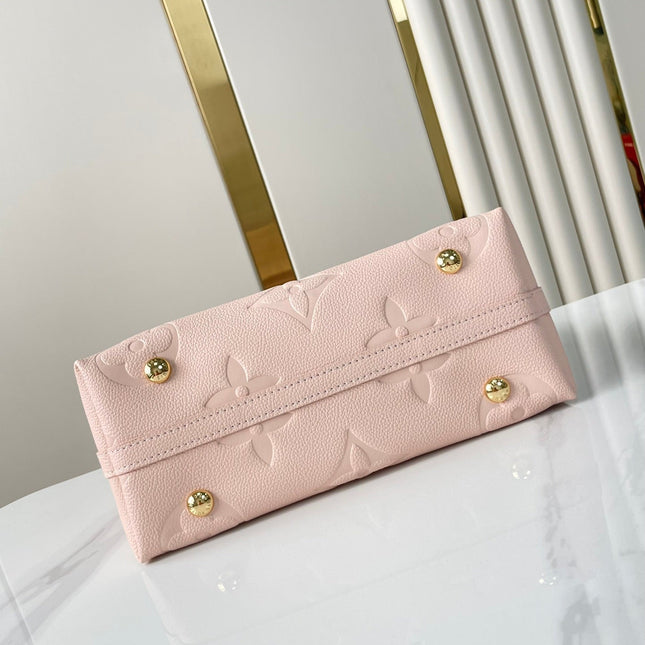 CARRYALL 29 IN LIGHT PINK MONOGRAM EMPREINTE LEATHER