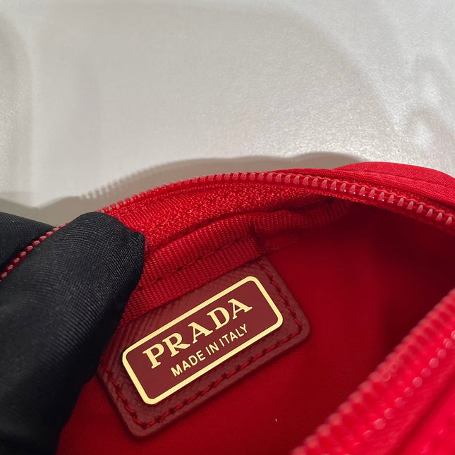 CLUTCH 12 IN PASSION RED RE-NYLON