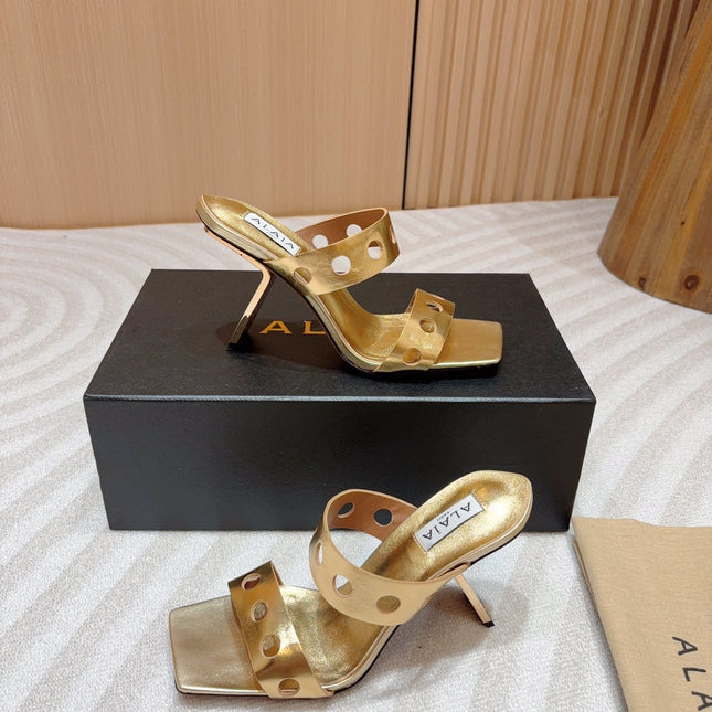ALAIA TWO-STRAPS HIGH HEEL SANDALS IN GOLDEN PATENT LAMBSKIN