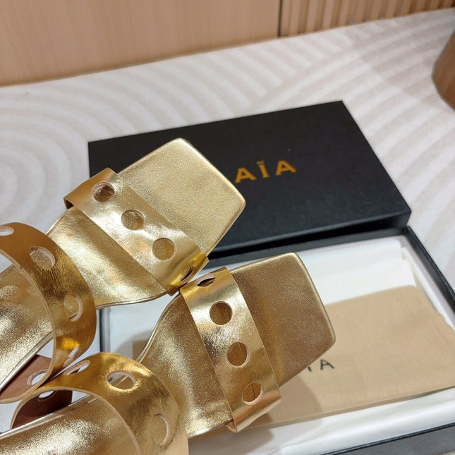 ALAIA TWO-STRAPS HIGH HEEL SANDALS IN GOLDEN PATENT LAMBSKIN