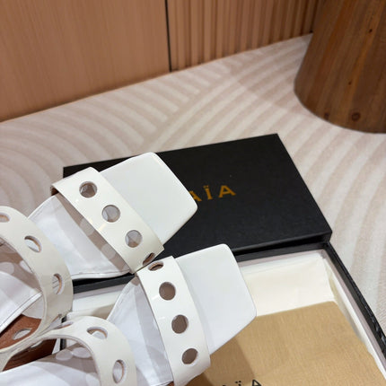 ALAIA TWO-STRAPS HIGH HEEL SANDALS IN WHITE PATENT LAMBSKIN