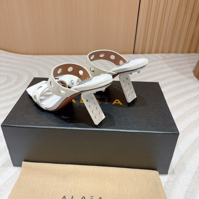 ALAIA TWO-STRAPS HIGH HEEL SANDALS IN WHITE PATENT LAMBSKIN
