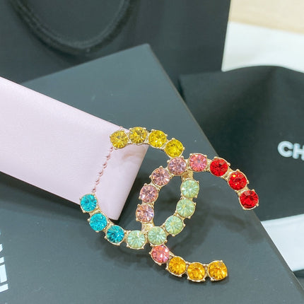 CC BELT 30 MM IN PASTEL PINK CALFSKIN WITH COLORFUL RHINSTONES METAL LOGO
