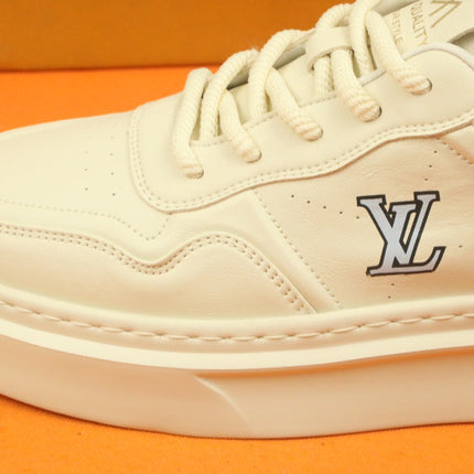 LV TRAINER IN BEIGE CREAM CALFSKIN AND GREY LOGO