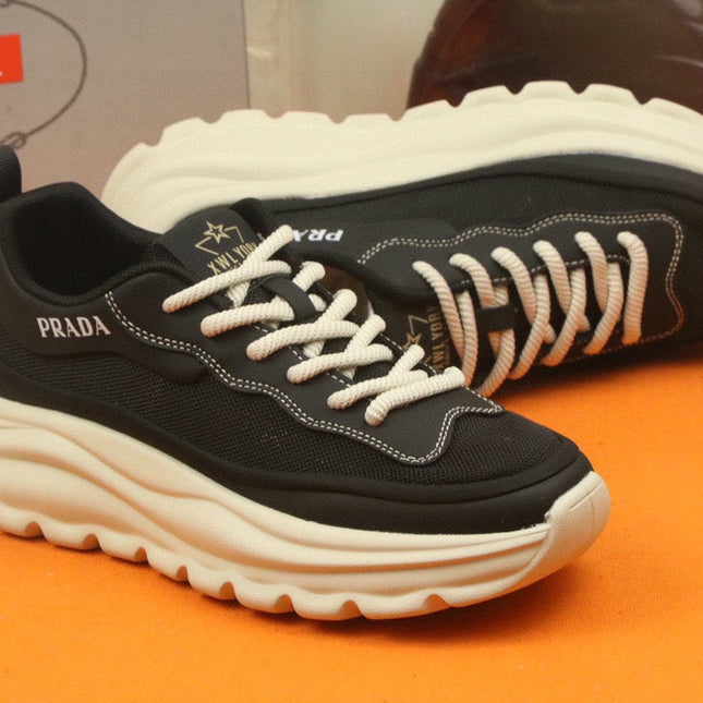 PRA SNEAKER IN BLACK CALFSKIN AND BREATHABLE MESH