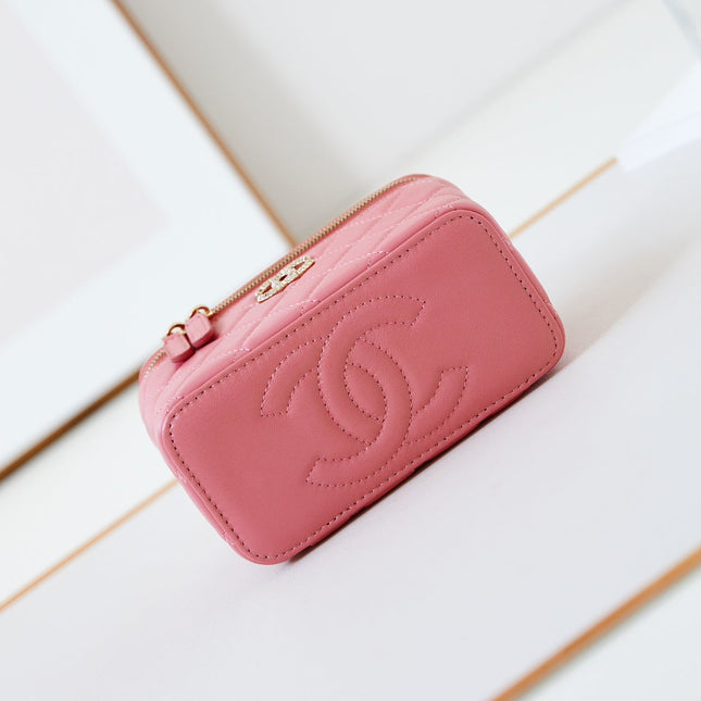 CHANEL 25S MINI VANITY BAG 16 CM IN PEACHY PINK LAMBSKIN WITH CRYSTAL-EMBELLISHED CC LOGO