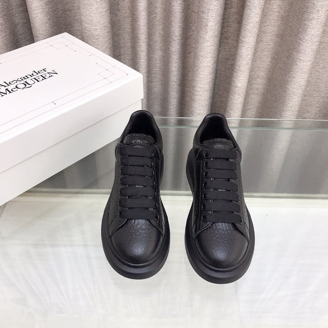 OVERSIZED SNEAKERS IN BLACK TEXTURED CALFSKIN EMBOSSED LOGO