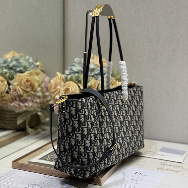 MEDIUM 37 TOUJOURS BAG IN BLACK MONOGRAM DENIM
