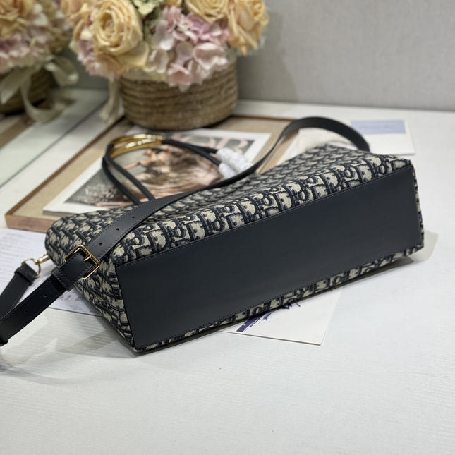MEDIUM 37 TOUJOURS BAG IN BLACK MONOGRAM DENIM