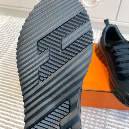 BOUNCING SNEAKER IN BLACK GRAPHIC MESH AND CALFSKIN