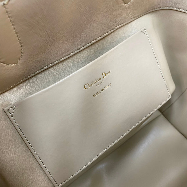 MEDIUM TOUJOURS BUCKET BAG 22 IN BEIGE CANNAGE CALFSKIN