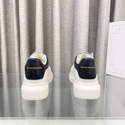 OVERSIZED SNEAKERS IN WHITE CALFSKIN WITH BLACK HEEL TAB