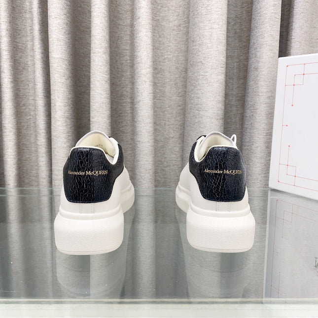 OVERSIZED SNEAKERS IN WHITE CALFSKIN WITH BLACK HEEL TAB