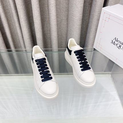 OVERSIZED SNEAKERS IN WHITE CALFSKIN WITH BLACK HEEL TAB