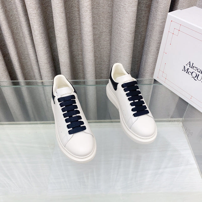 OVERSIZED SNEAKERS IN WHITE CALFSKIN WITH BLACK HEEL TAB