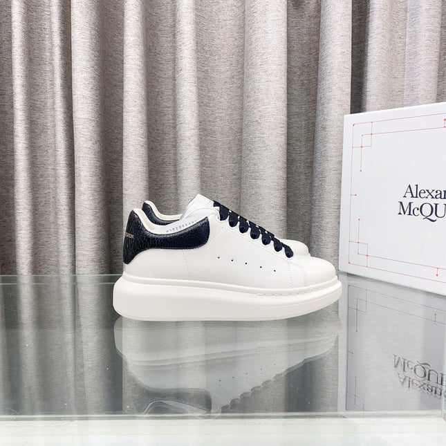 OVERSIZED SNEAKERS IN WHITE CALFSKIN WITH BLACK HEEL TAB