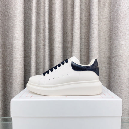 OVERSIZED SNEAKERS IN WHITE CALFSKIN WITH BLACK HEEL TAB