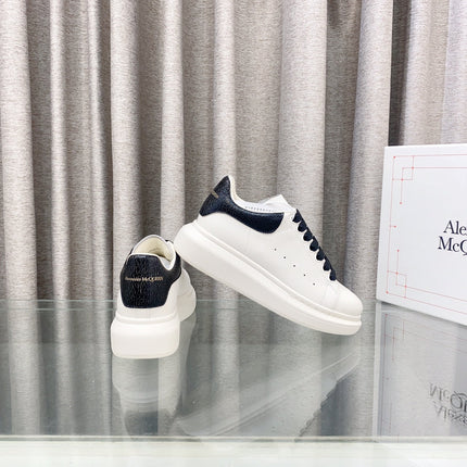 OVERSIZED SNEAKERS IN WHITE CALFSKIN WITH BLACK HEEL TAB