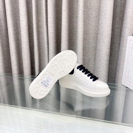OVERSIZED SNEAKERS IN WHITE CALFSKIN WITH BLACK HEEL TAB