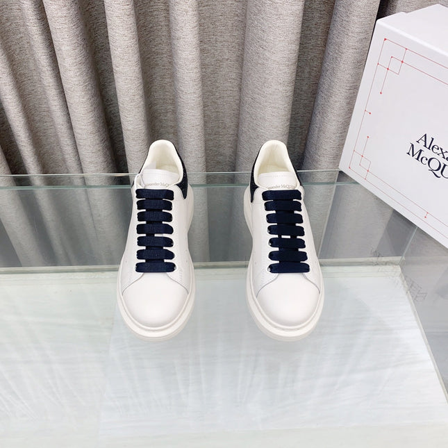 OVERSIZED SNEAKERS IN WHITE CALFSKIN WITH BLACK HEEL TAB