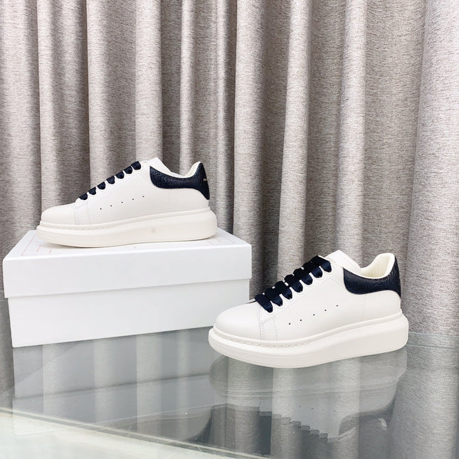 OVERSIZED SNEAKERS IN WHITE CALFSKIN WITH BLACK HEEL TAB