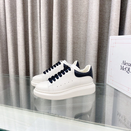 OVERSIZED SNEAKERS IN WHITE CALFSKIN WITH BLACK HEEL TAB