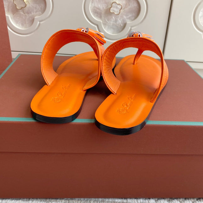 FLIP FLOPS IN ORANGE LAMBSKIN SNAKE EMBOSSING