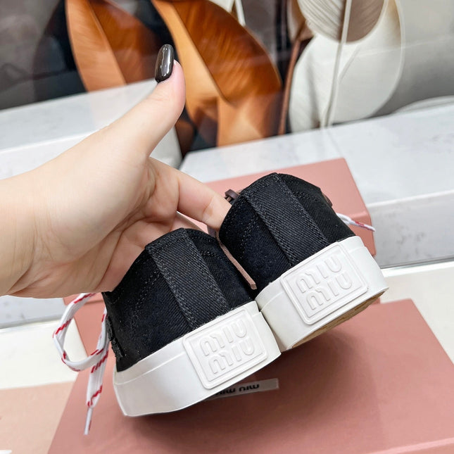WASHED-DENIM SNEAKERS IN BLACK CANVAS WITH BROWN AND STRIPED LACES