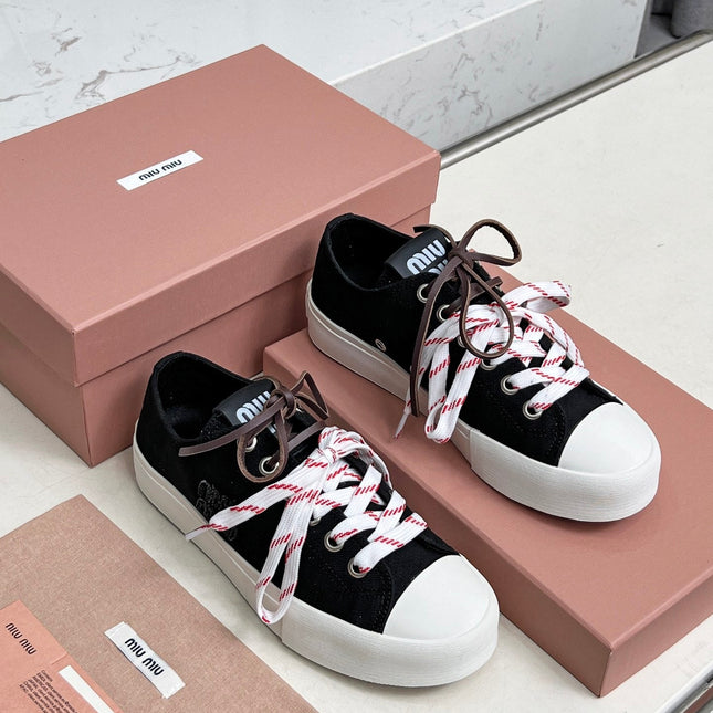 WASHED-DENIM SNEAKERS IN BLACK CANVAS WITH BROWN AND STRIPED LACES