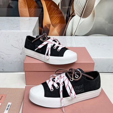 WASHED-DENIM SNEAKERS IN BLACK CANVAS WITH BROWN AND STRIPED LACES